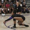 Faith Wyatt digs for a ball.